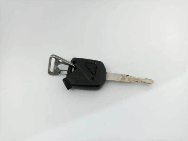 istock A motorcycle key with a white background. Motorcycle key isolated in white 2169138718