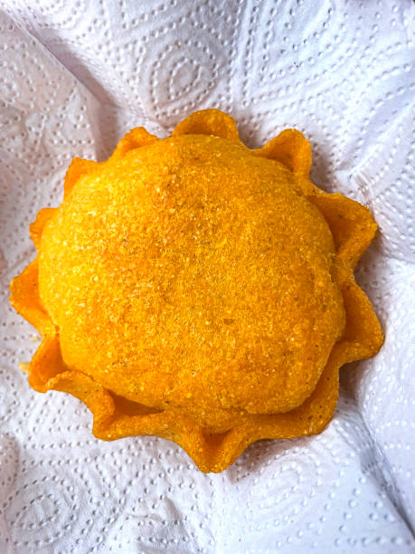 Fried chicken empanada on a napkin