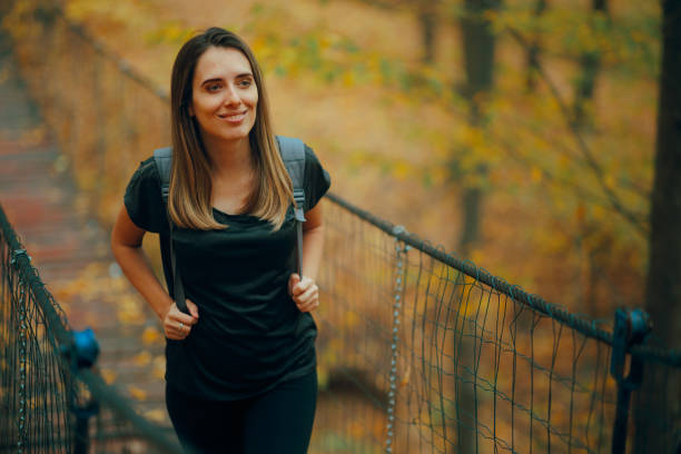 Cheerful tourist feeling excited about walking in nature