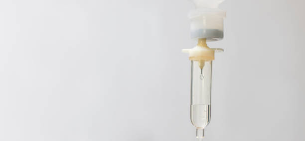 istock Saline drip in the hospital. 0.9% Normal saline solution NSS. Set vitamin iv fluid intravenous drop Because it is influenza A. Concept about of treatment, emergency, medical, chemotherapy, sick. 2169149295