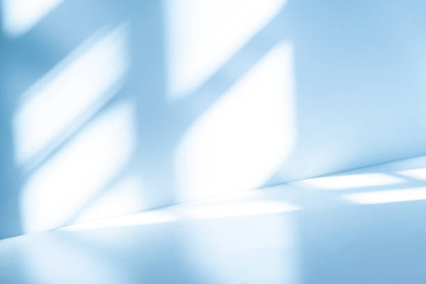 istock Studio style background wall decoration presentation uses white and blue tones. with shadows cast from a nearby window, concept creating a decorative 2169160397