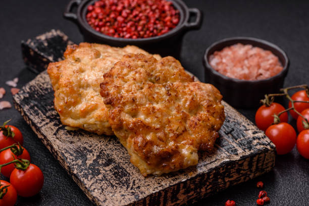 istock Delicious fried pork or chicken chops breaded with salt and spices 2169168856