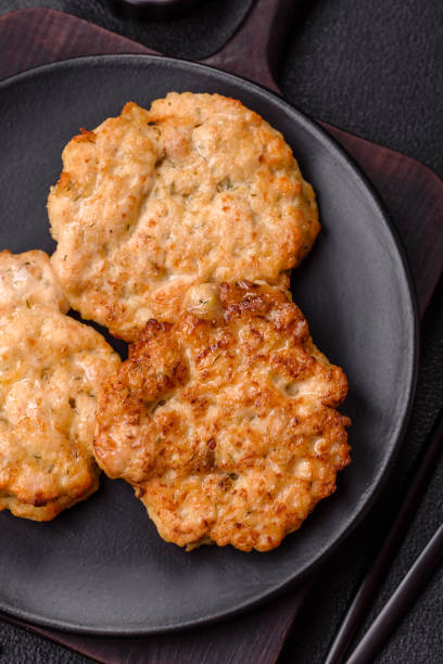 istock Delicious fried pork or chicken chops breaded with salt and spices 2169168902