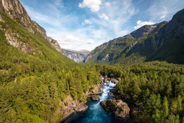istock Lush valley with river in Norwegian mountains 2169177999
