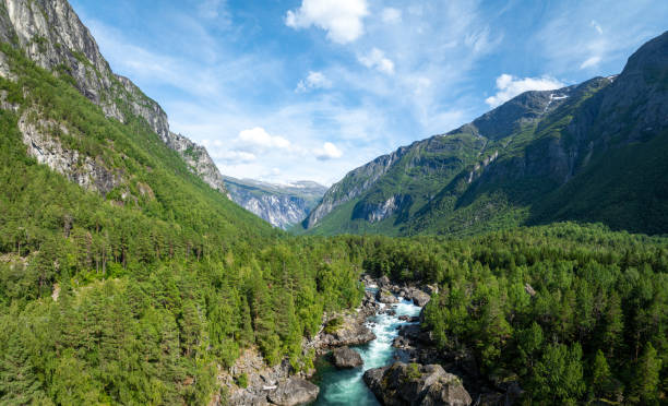 istock Lush valley with river in Norwegian mountains 2169178007