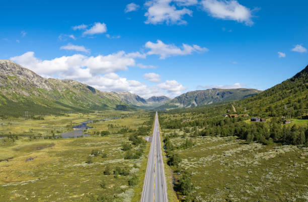 istock Endless road through Norwegian mountain valley 2169178142