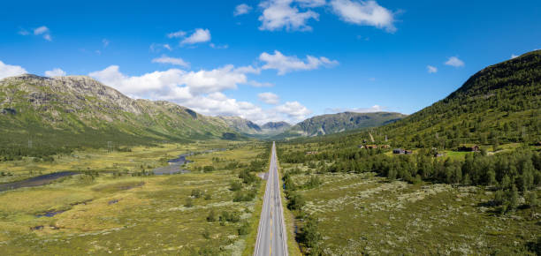 istock Endless road through Norwegian mountain valley 2169178156