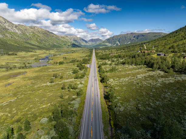 istock Endless road through Norwegian mountain valley 2169178170