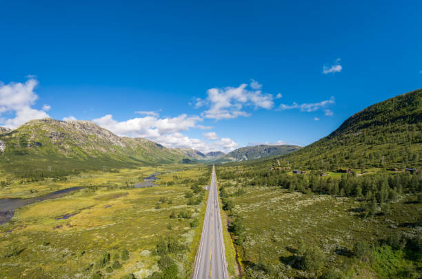 istock Endless road through Norwegian mountain valley 2169178195