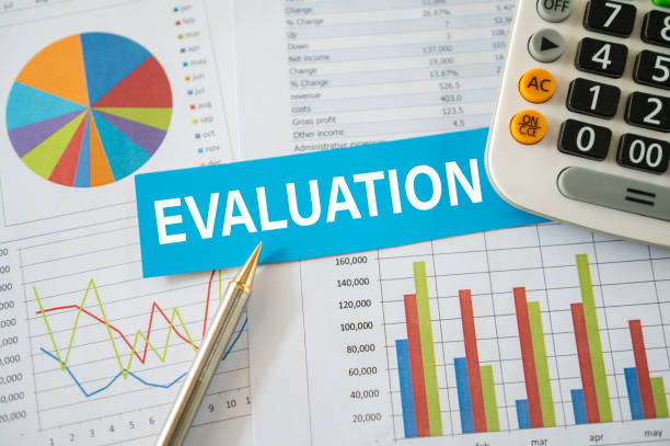 istock evaluation concept. evaluation report for follow and assessed the projects success and effectiveness. 2169178419