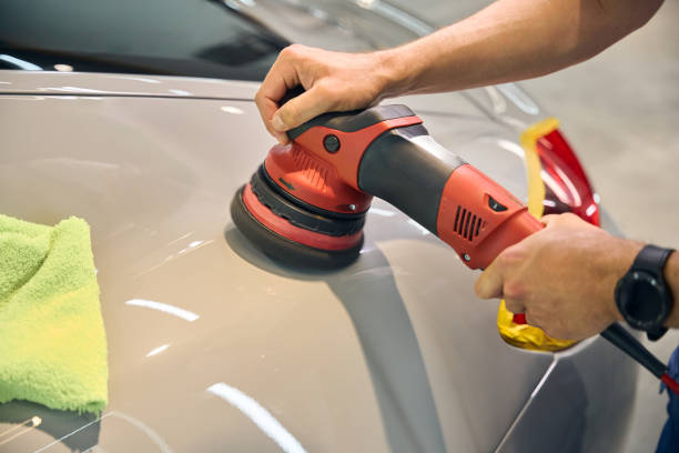 istock Male uses a modern polishing machine in the detailing process 2169180609