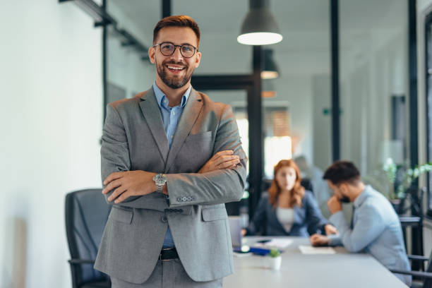 istock Successful businessman looking at camera with confidence 2169186496