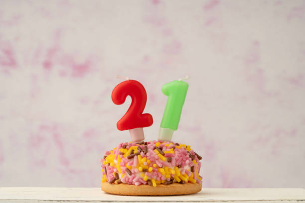 istock birthday cake with candles with number 21 2169189464