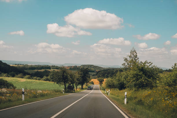Road in Germany in summer with sky\nphoto taken in daytime