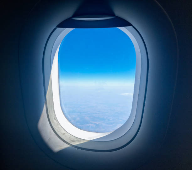 istock Flying above the clouds illuminated by the morning sun 2169193596