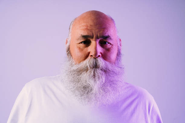 istock Senior old man with gray beard beauty portrait in studio 2169194788