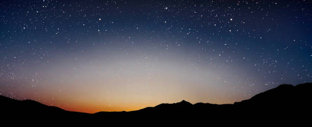 istock a Night sky panorama with stars and moon 2169198373
