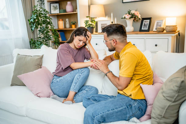 istock Caring husband holding his wife hand 2169198893