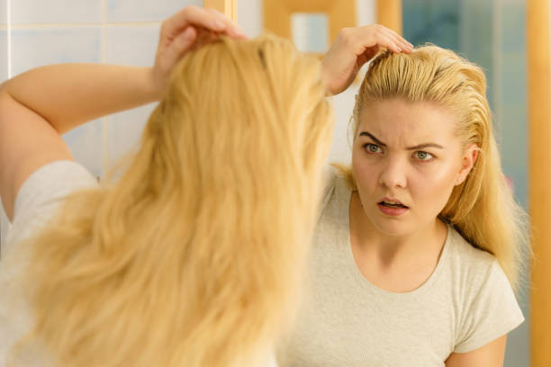 istock Female having problem with blonde hair 2169199009