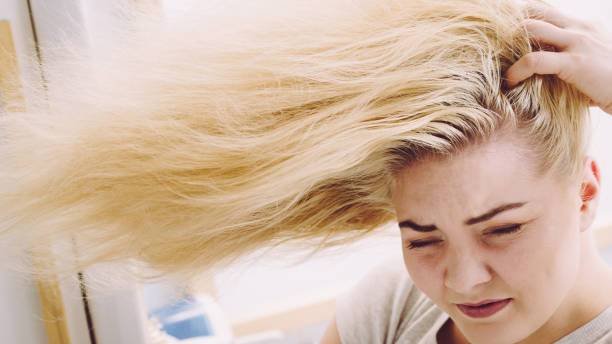istock Female having problem with blonde hair 2169199145