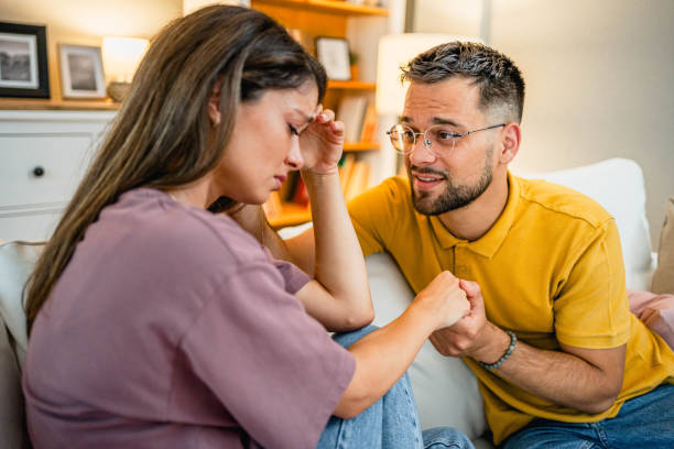 istock Caring husband holding his wife hand 2169199464