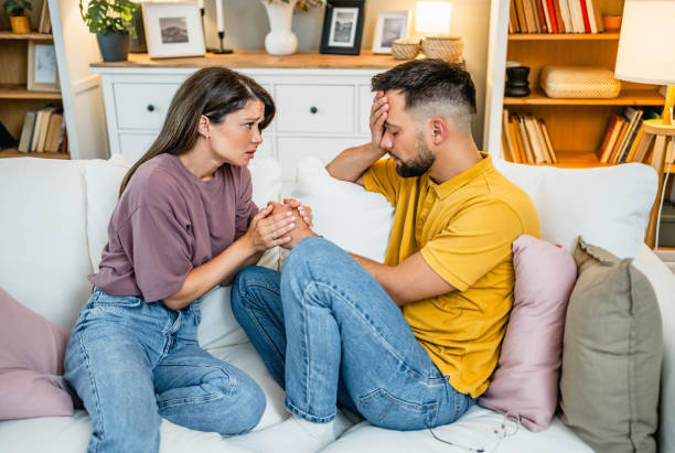 istock Woman comforting her husband 2169199621