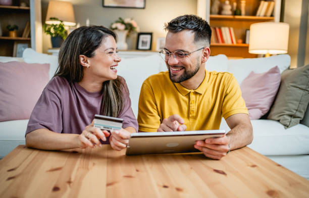 istock Happy couple shopping online 2169199715