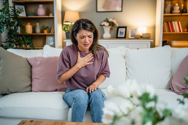 istock Young woman suffering from chest pain 2169200267