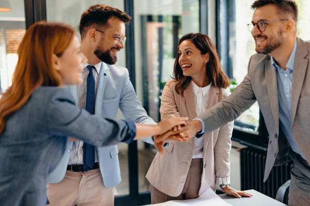 istock Team meeting with businesspeople collaborating on a project. Positive team motivation 2169200469