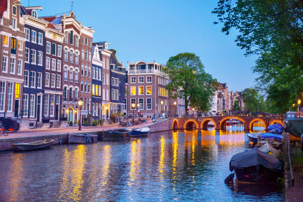 istock Houses and bridge in Amsterdam 2169201846