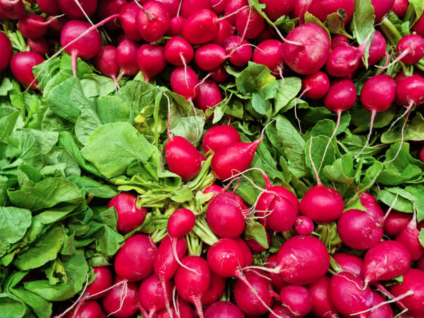 istock Sections of fresh organic vegetables in a market 2169202043
