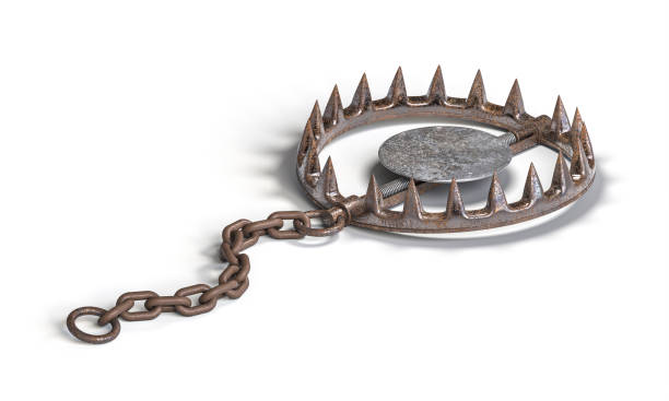 istock Rusty bear trap with metal teeth is waiting on white background 2169202125