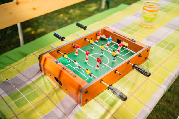 Small Foosball Table Game on a Table in the Sunlight
