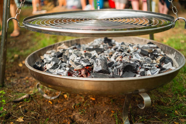 Charcoal with Red Glowing Hot Ember in a Metal Bowl on a Fireplace Ready to Grill the Meat