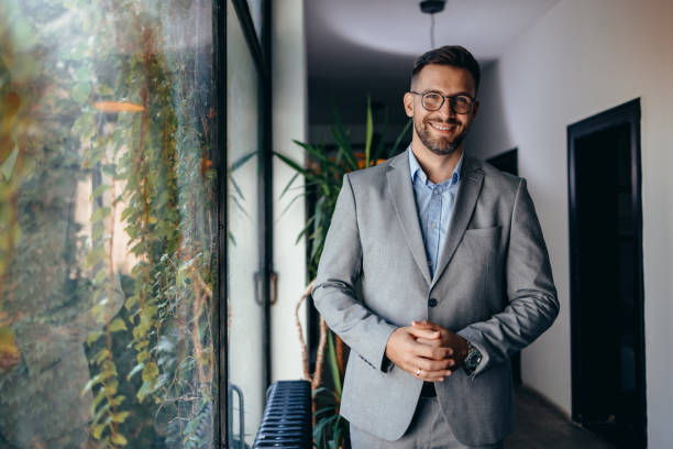 istock Successful businessman looking at camera with confidence 2169207482