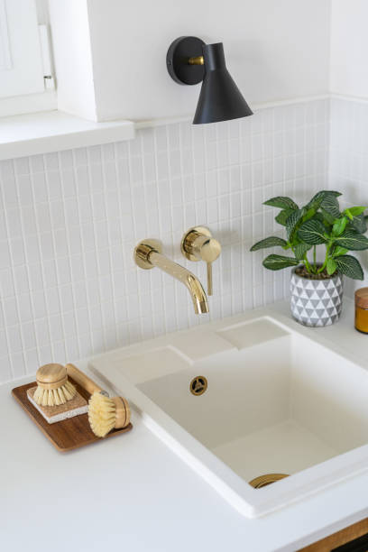 istock A modern kitchen interior with sink and gold water tap 2169210973