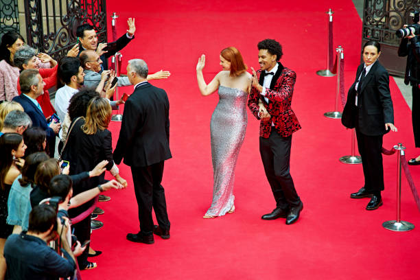 istock Fans, security, and celebrities at red carpet event 2169212020