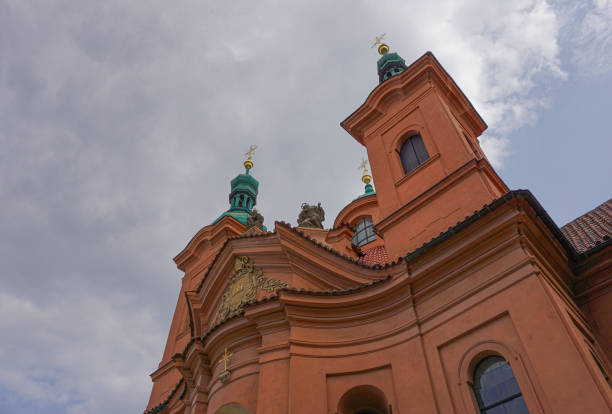 Low angle view of a building against cloudy sky