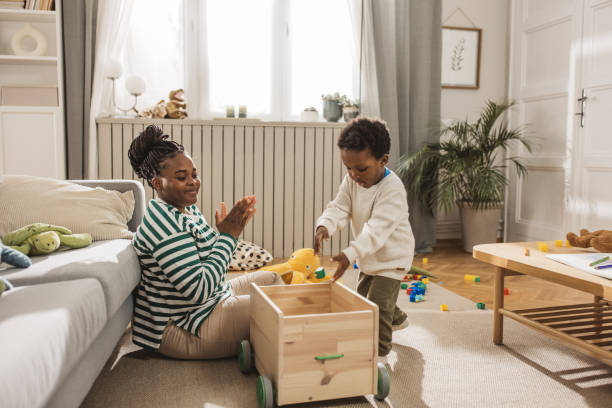 istock Mother playing with her son at home 2169213805