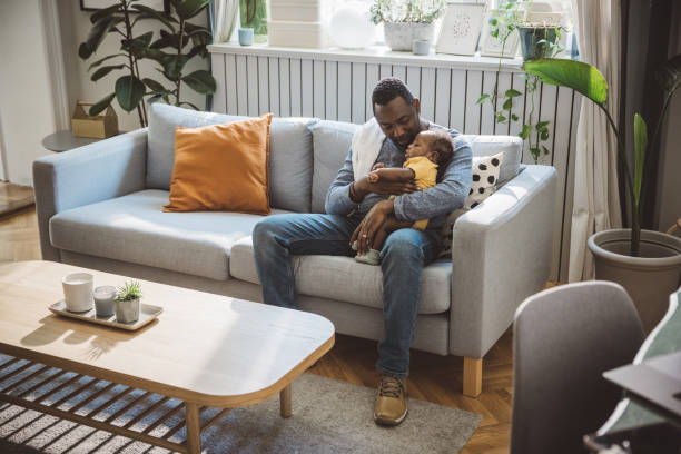 istock Father and baby at home 2169219099