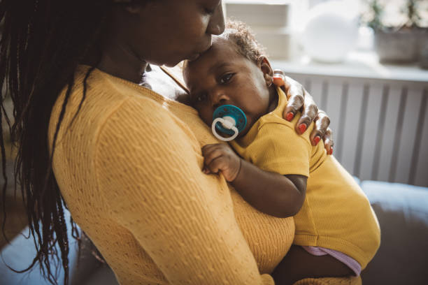 istock Mother and baby at home 2169219106