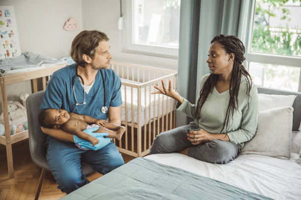istock Pediatrician at home visit 2169219278