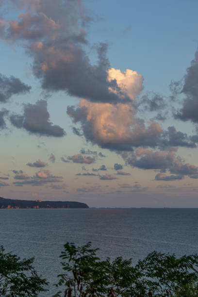 cumulus clouds over the sea