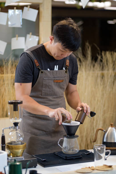 istock barista is preparing equipment for making coffee. 2169229331