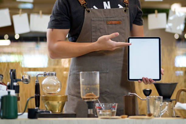 istock barista is preparing equipment for making coffee. 2169229570