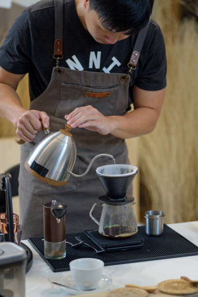 istock barista is preparing equipment for making coffee. 2169231407