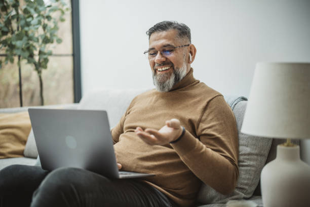 istock Mature man working from home 2169231759