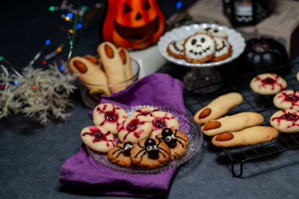istock Halloween cookies on wooden background 2169232873