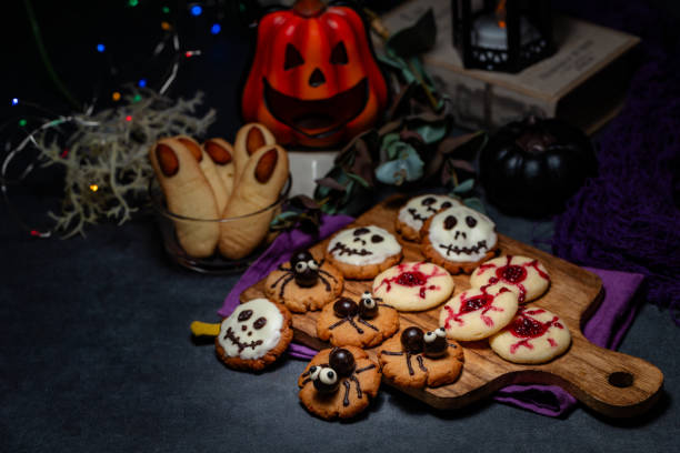 istock Halloween cookies on wooden background 2169232877