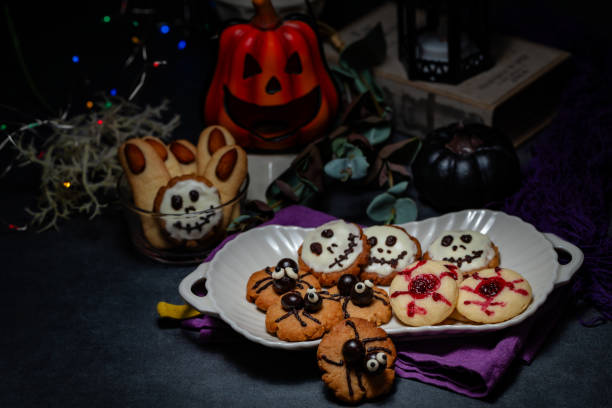 istock Halloween cookies on wooden background 2169232895